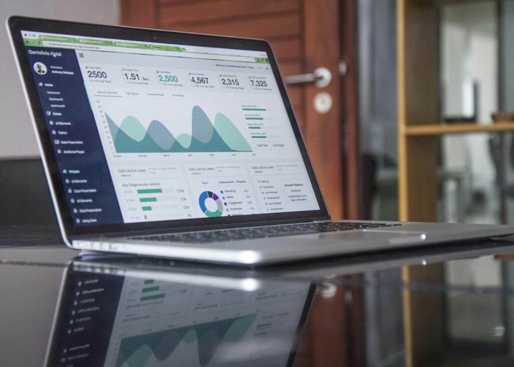 Laptop showing a growth marketing analytics dashboard