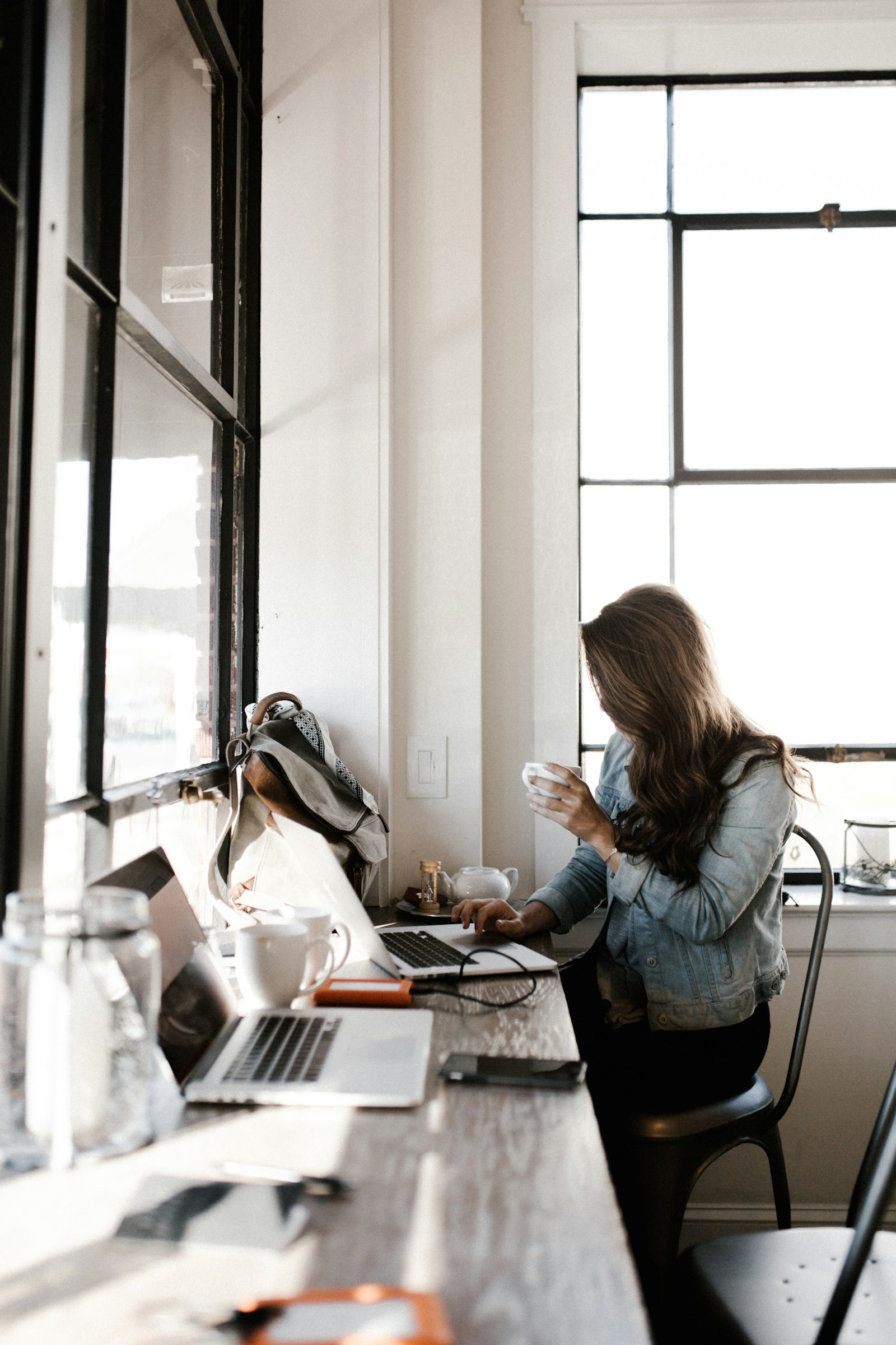 Service business owner working on an email nurture sequence on a laptop