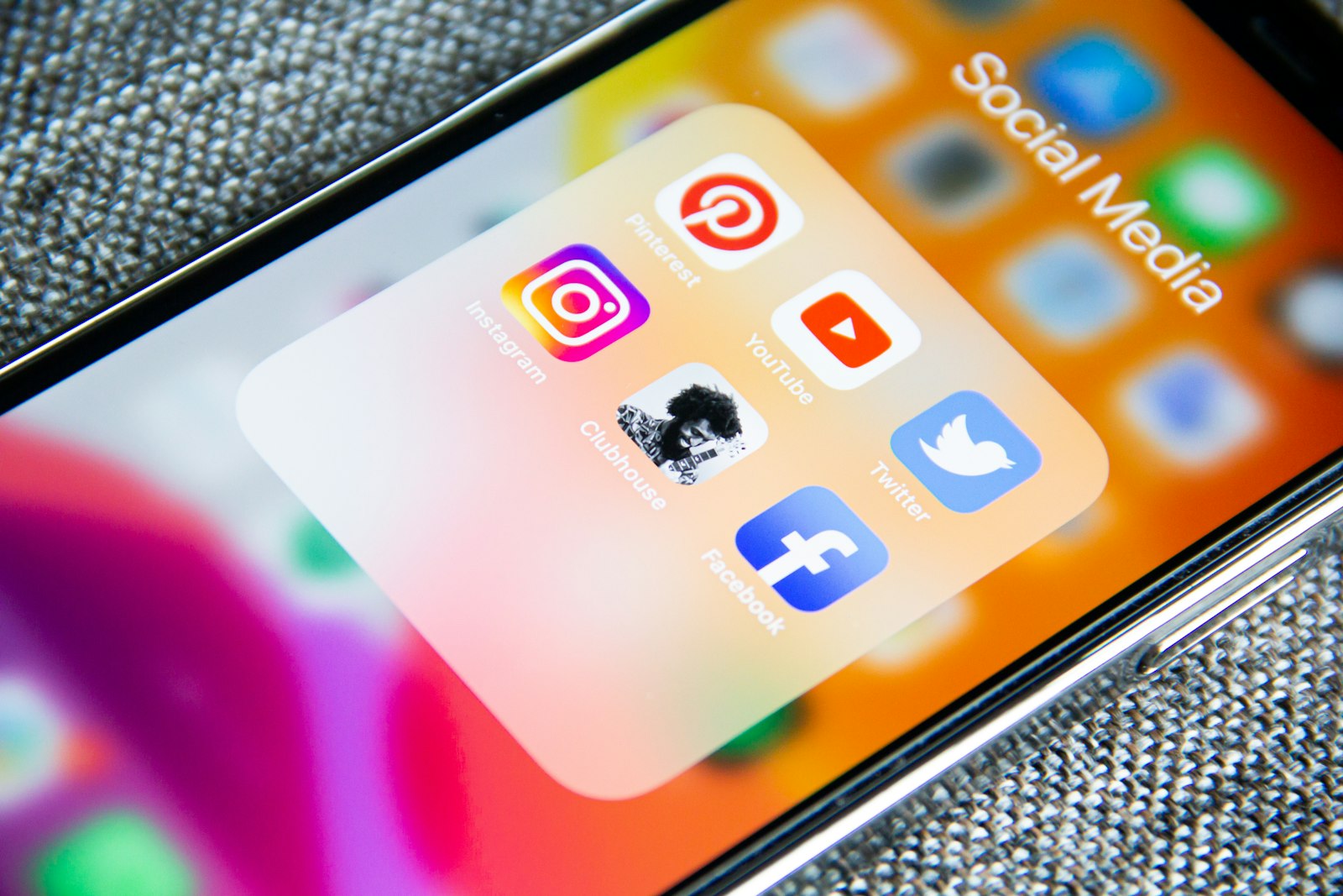 Social media app icons on a smartphone screen